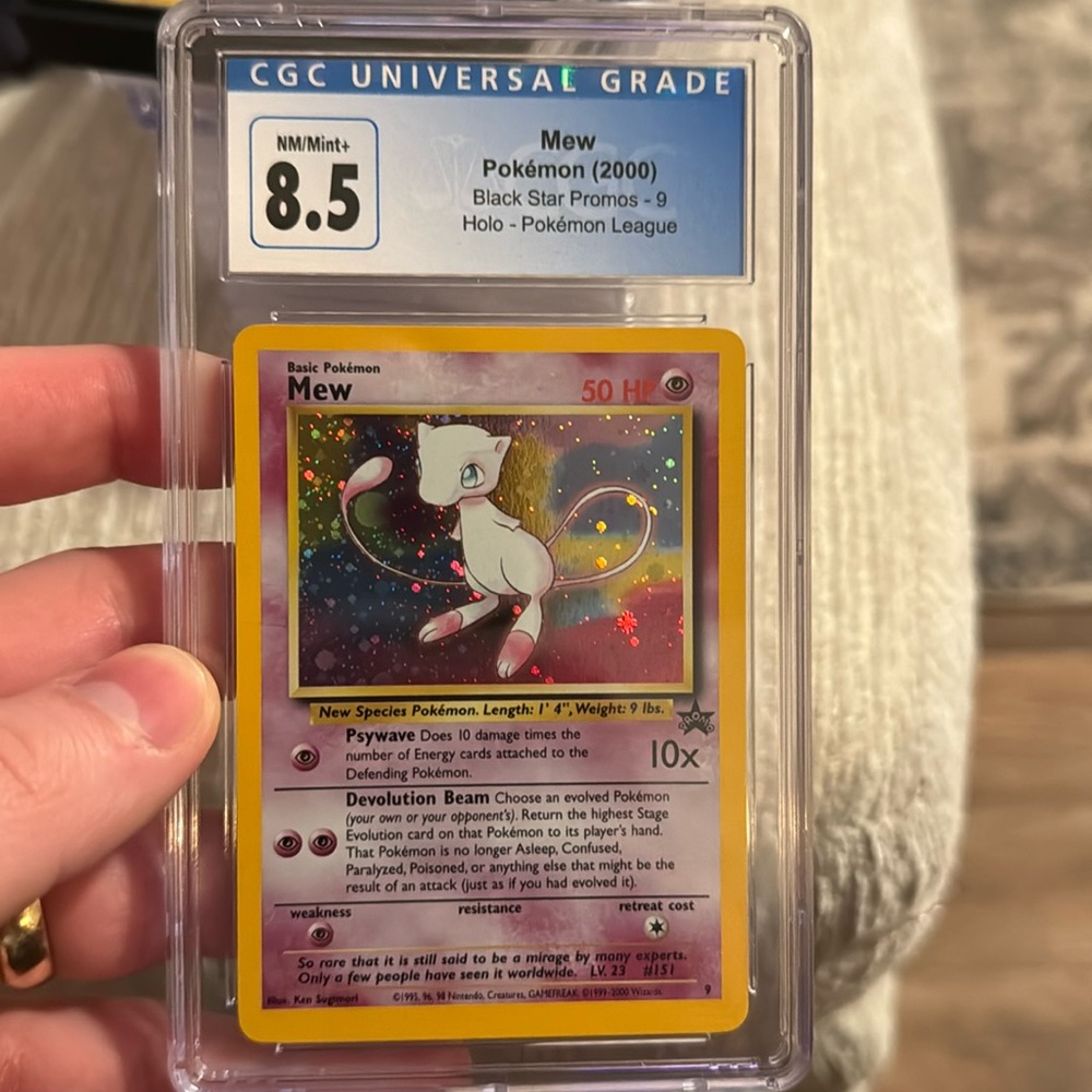 Mew Black Star Promo Holo. CGC 8.5